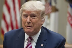 Ông Trump muốn tham khảo ý kiến Thủ tướng Đức về ông Putin. (Nguồn: AFP)