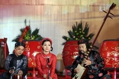 Biểu diễn ca trù. (Ảnh: TTXVN)