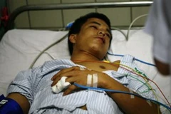 Cường vẫn rất yếu sau khi nhập viện. (Ảnh: Sơn Bách/Vietnam+)