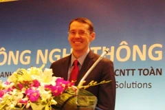 Tổng Giám đốc công ty Microsoft Việt Nam, ông Jamie Harper tại hội thảo (Ảnh: PV/Vietnam+)