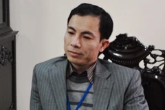 Con số mộ bị vùi lấp mà vị Chủ tịch phường đưa ra vẫn bị đặt dấu hỏi. (Ảnh: Sơn Bách/Vietnam+)