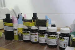 Nhiều sản phẩm do Công ty Cổ phần Vinaca.vn sản xuất trái phép bị thu giữ tại TP.Hồ Chí Minh chiều 17/4. (Ảnh: Đinh Hằng/TTXVN)