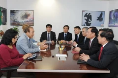 Đồng chí Phạm Văn Linh (thứ 2 bên phải) tại buổi làm việc với Tổng Giám đốc hãng Thông tấn Quốc gia Mexico, Alejandro Ramos Esquivel. (Ảnh: Lưu Việt Hùng/TTXVN)
