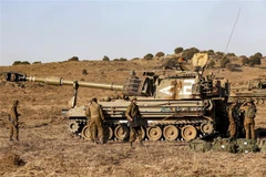 Binh sỹ Israel tham gia một cuộc diễn tập quân sự tại Cao nguyên Golan, gần Merom Golan trên biên giới với Syria. (Ảnh: AFP/TTXVN)