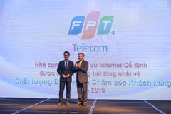 FPT Telecom đã nhận được giải 'Nhà cung cấp dịch vụ Internet Cố định được khách hàng hài lòng nhất về Chất lượng dịch vụ và Chăm sóc khách hàng 2019. (Ảnh: PV/Vietnam+)