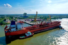 Hậu Giang tiếp nhận tàu tải trọng 20.000 tấn cập cảng VIMC. (Ảnh: Duy Khương/TTXVN)