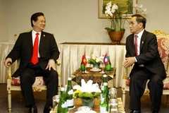 Thủ tướng Nguyễn Tấn Dũng gặp Thủ tướng Lào Thoongsing Thammavong. (Ảnh: Đức Tám/TTXVN)