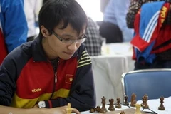 Kỳ thủ Nguyễn Ngọc Trường Sơn là một trong những kỳ thủ hàng đầu tham dự giải cờ vua nhanh, chớp nhoáng toàn quốc. (Ảnh: Quốc Khánh/TTXVN)