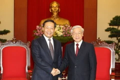 Tổng Bí thư Nguyễn Phú Trọng tiếp Bí thư Khu ủy Khu tự trị dân tộc Choang Quảng Tây, Trung Quốc Bành Thanh Hoa. (Ảnh: Trí Dũng/TTXVN)