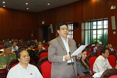 Đại biểu Quốc hội tỉnh Nghệ An, Phan Văn Quý phát biểu ý kiến. (Ảnh: Doãn Tấn/TTXVN)