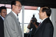 Chủ tịch nước Nguyễn Minh Triết gặp Chủ tịch Ủy ban thường vụ Hội nghị Nhân dân tối cao Triều Tiên Kim Yong Nam. (Ảnh: Nguyễn Khang/TTXVN) 