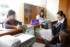 Ngân hàng BIDV, chi nhánh Đào Duy Anh, quận Đống Đa, Hà Nội. (Ảnh: Phạm Hậu/TTXVN)