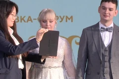 Roman và Daria Babayev tại lễ cưới đầu tiên tại Nga ứng dụng sinh trắc học. (Nguồn: rbc.ru)