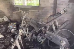 Hiện trường vụ cháy khiến 3 người tử vong. (Ảnh: Quang Thái/TTXVN)