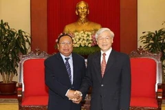 Tổng Bí thư Nguyễn Phú Trọng tiếp ông Phandouangchit Vongsa. (Ảnh: Trí Dũng/TTXVN)