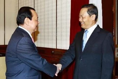 Bí thư Thành ủy TP.HCM Lê Thanh Hải tiếp ông Bành Thanh Hoa, Bí thư Khu ủy Khu tự trị dân tộc Choang. (Ảnh: Doãn Tấn/TTXVN)