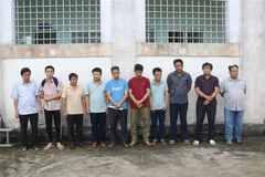 10 bị can bị bắt tạm giam. (Ảnh: TTXVN phát)
