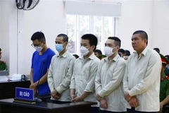 Các bị cáo tại phiên tòa ngày 16/10. (Ảnh: Huyền Trang/TTXVN)