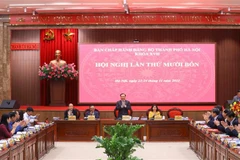 Bí thư Thành ủy Hà Nội Đinh Tiến Dũng tại hội nghị. (Ảnh: Văn Điệp/TTXVN)