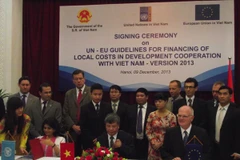 Lễ ký kết Hướng dẫn định mức chi phí địa phương giữa VN, UN và EU. (Ảnh: Vietnam+)