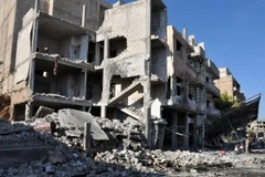 Cảnh đổ nát sau vụ đánh bom tại khu vực Bab Tadmur thuộc tỉnh Homs, Syria. (Nguồn: EPA/TTXVN)
