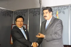 Phó Thủ tướng Phạm Bình Minh gặp Tổng thống Venezuela Nicolas Maduro. (Ảnh: Vũ Lê Hà/TTXVN)