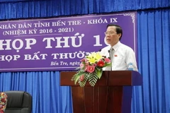 Chủ tịch Hội đồng Nhân dân ông Phan Văn Mãi phát biểu tại kỳ họp. (Ảnh: Huỳnh Phúc Hậu/TTXVN)