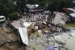 Hiện trường vụ sạt lở đất bờ sông tại khu vực tổ 14, ấp Tây Khánh 5, phường Mỹ Hòa, thành phố Long Xuyên (An Giang). (Ảnh: Công Mạo/TTXVN)