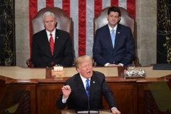 Tổng thống Mỹ Donald Trump (phía trước) đọc thông điệp liên bang tại Quốc hội ở Washington, DC ngày 30/1/2018. (Nguồn: AFP/TTXVN)