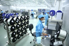 Bên trong nhà máy sản xuất sợi thủy tinh dùng cho thông tin quang của VNPT. (Ảnh: Nguyễn Thúy)