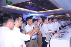 Các giải pháp chuyển đổi số của VNPT thu hút sự quan tâm của các đại biểu. (Ảnh: C.H/Vietnam+)