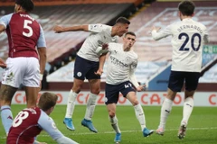 MAn City (áo trắng) đã rất gần với ngôi vương Premier League. (Nguồn: Getty Images)