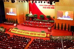 Đại hội nghe đồng chí Nguyễn Phú Trọng, Tổng Bí thư Ban Chấp hành Trung ương Đảng, Chủ tịch nước CHXHCN Việt Nam đọc Báo cáo chính trị của Ban Chấp hành Trung ương Đảng khóa XII về các văn kiện trình Đại hội XIII của Đảng. (Ảnh: TTXVN)