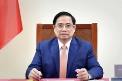 Thủ tướng Phạm Minh Chính điện đàm với Thủ tướng Đức Angela Merkel. (Ảnh: Dương Giang/TTXVN)