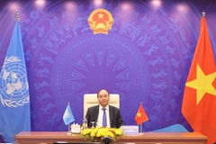 Thủ tướng Chính phủ Nguyễn Xuân Phúc phát biểu tại điểm cầu Hà Nội. (Ảnh: Thống Nhất/TTXVN)