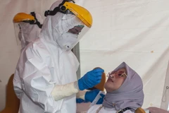 Số ca mắc ở Indonesia tăng đột biến. (Ảnh: THX/TTXVN)