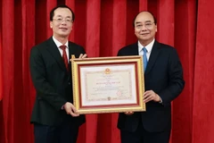 Chủ tịch nước trao tặng Huân chương cho nguyên lãnh đạo Bộ Xây dựng