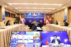 Phó Thủ tướng, Bộ trưởng Bộ Ngoại giao Phạm Bình Minh chủ trì Hội nghị trực tuyến Hội đồng Chính trị - An ninh ASEAN lần thứ 21. (Ảnh: Văn Điệp/TTXVN)