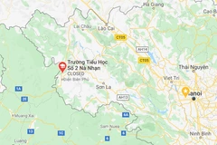 Hiện trường phát hiện thi thể người đàn ông treo cổ. (Ảnh: Song Xuân/Vietnam+)