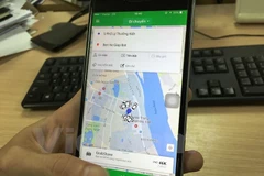 Dịch vụ đi chung xe GrabShare của Grab. (Ảnh: Việt Hùng/Vietnam+)