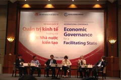 Hội nghị quốc tế “Quản trị kinh tế hướng tới Nhà nước kiến tạo”, ngày 13/6. (Ảnh: PV/Vietnam+)