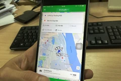 Dịch vụ đi chung xe GrabShare của Grab. (Ảnh: Việt Hùng/Vietnam+)