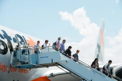 Hành khách trên chuyến bay của Jetstar Pacific. (Ảnh: Jetstar cung cấp)