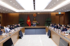 Phó Thủ tướng Vũ Đức Đam, Trưởng Ban Chỉ đạo quốc gia phòng, chống dịch bệnh COVID-19 chủ trì cuộc họp. (Ảnh: Dương Giang/TTXVN)