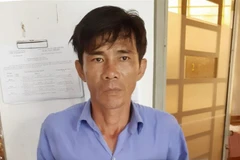 Đối tượng Phạm Trường Giang tại Cơ quan Công an. (Ảnh: TTXVN phát)