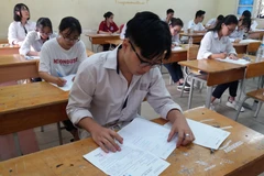 Thí sinh dự thi Trung học phổ thông quốc gia. (Ảnh: Phạm Mai/Vietnam+)