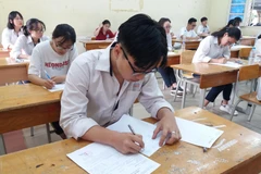 Thí sinh dự thi Trung học phổ thông quốc gia 2019. (Ảnh: Phạm Mai/Vietnam+)