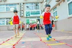 Môn Giáo dục thể chất đòi hỏi phải có cơ sở vật chất, dụng cụ học tập phù hợp. (Ảnh: PV/Vietnam+)