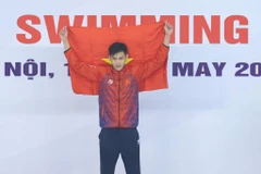 Vận động viên Thanh Bảo mong muốn cuộc sống gia đình được tốt hơn với vinh quang từ tấm huy chương vàng SEA Games. (Ảnh: Hải An/Vietnam+) 