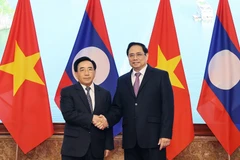 Báo chí Lào ca ngợi tình đoàn kết, hữu nghị đặc biệt với Việt Nam